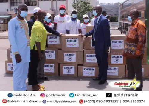 Presentation of personal protective equipment to Ridge Hospital in Accra by Mrs Stella Apenteng and Caleb Koffi with some officials of Goldstar Air, received by the Medical Director Dr Emmanuel K Srofenyoh and his team on behalf of Ridge Hospital.